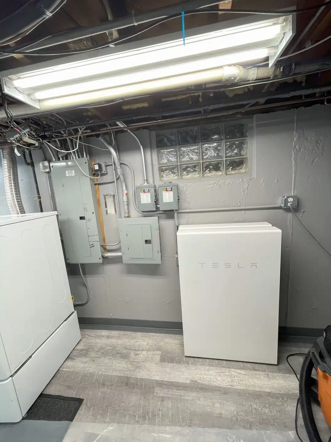 Tesla Powerwall battery storage units stacked for home energy backup