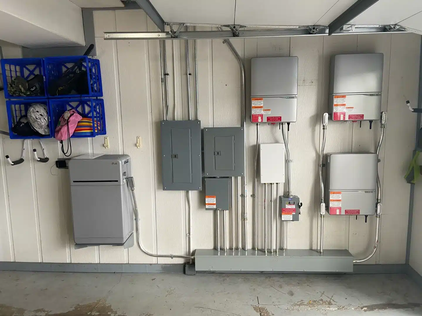Delta solar inverter mounted in a garage with balance of system components